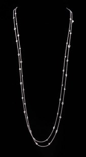 18 KT. WHITE GOLD AND DIAMOND
