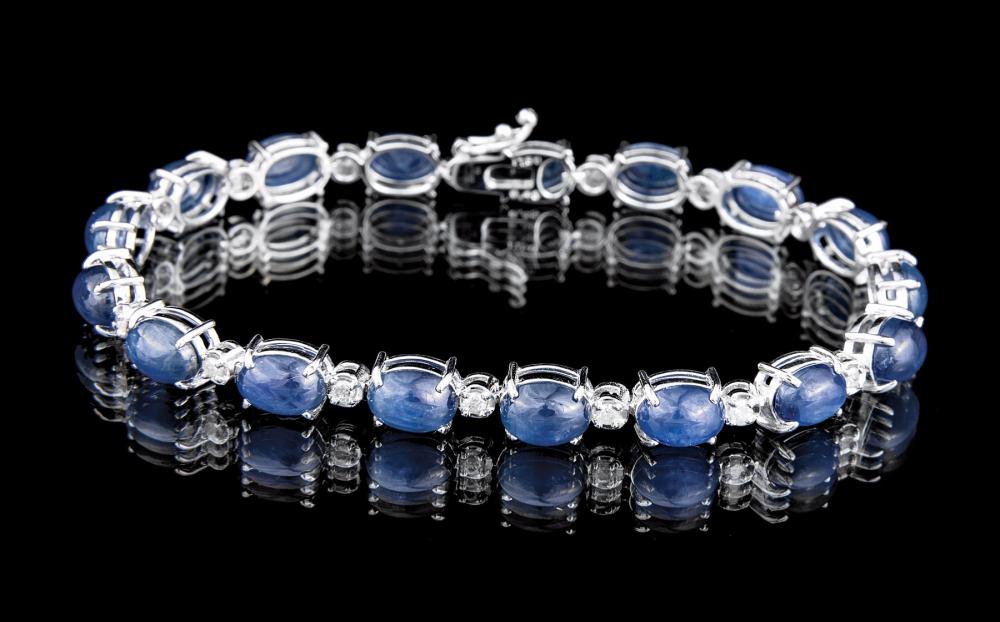 18 KT. WHITE GOLD, CABOCHON