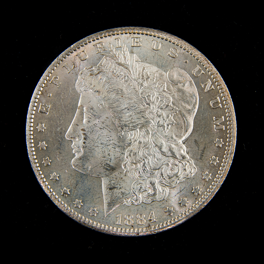 1884 CC MORGAN SILVER DOLLAR,
