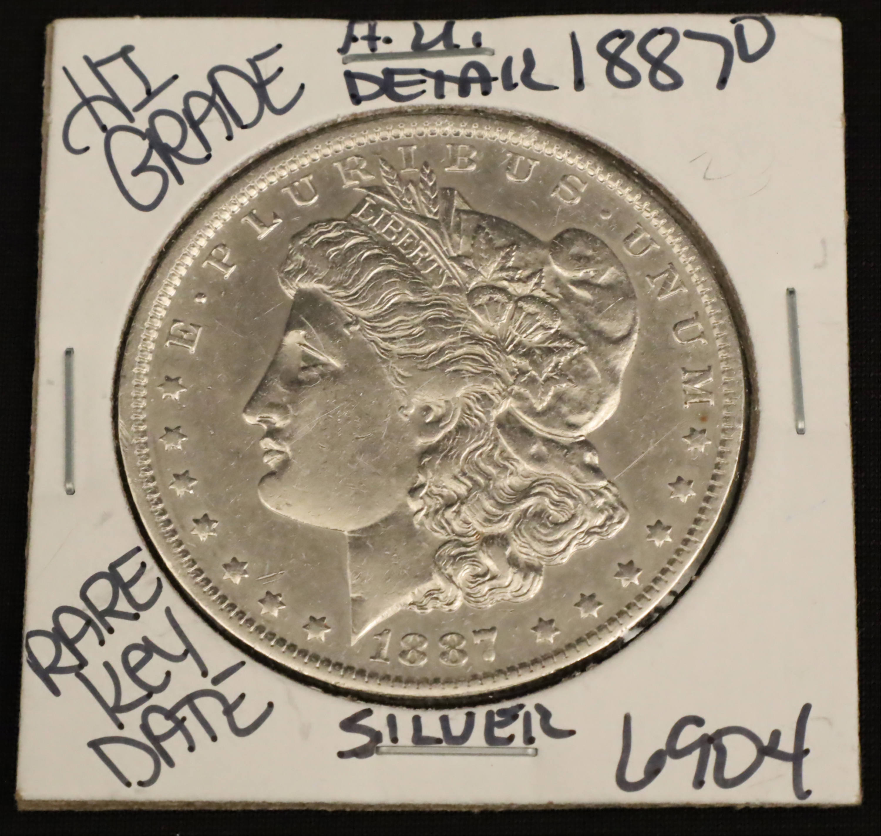 1887 O AU MORGAN SILVER DOLLAR 1887