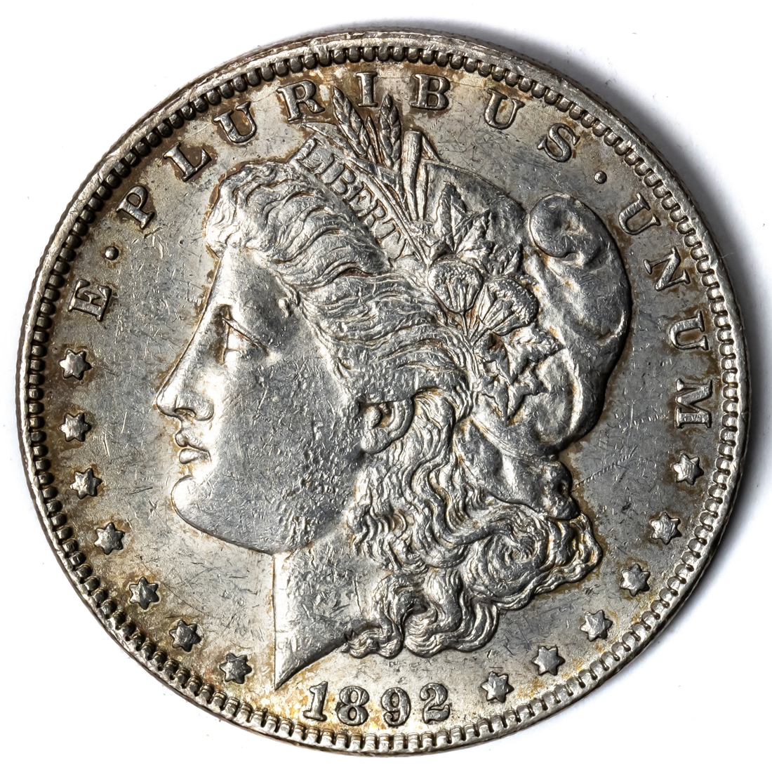 1892 MORGAN SILVER DOLLAR, AU+ 1892