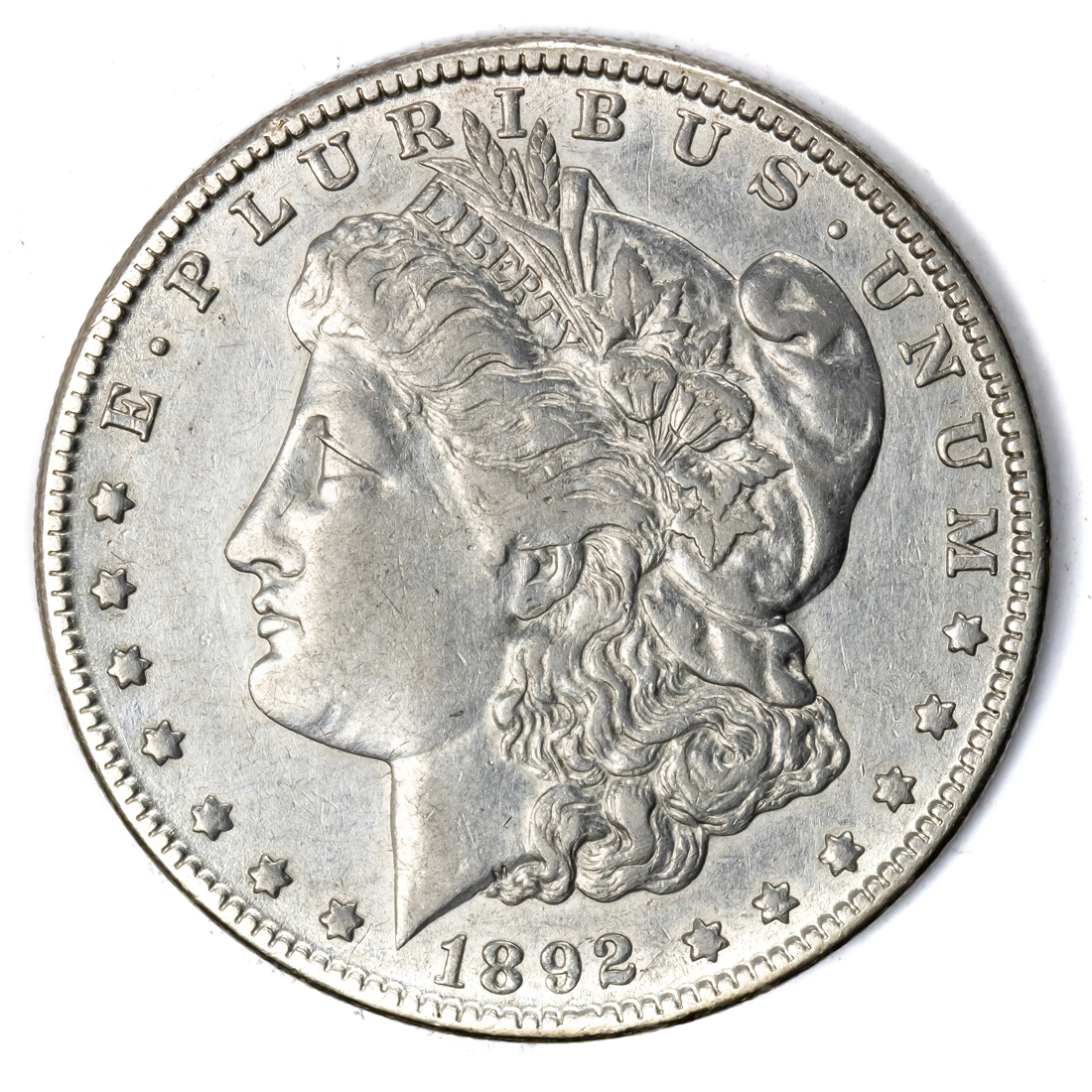 1892 O MORGAN SILVER DOLLAR,