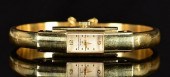 18K BAUM MERCIER CUFF BRACELET