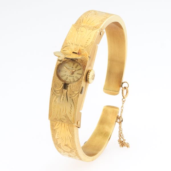 18K BUCHERER SPRING LOADED BRACELET