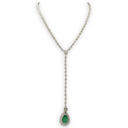 18K GOLD, 4CT EMERALD AND DIAMOND