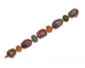 18K GOLD AND GEMSET BRACELET18