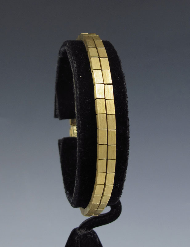 18K GOLD BRACELET: 14 yellow