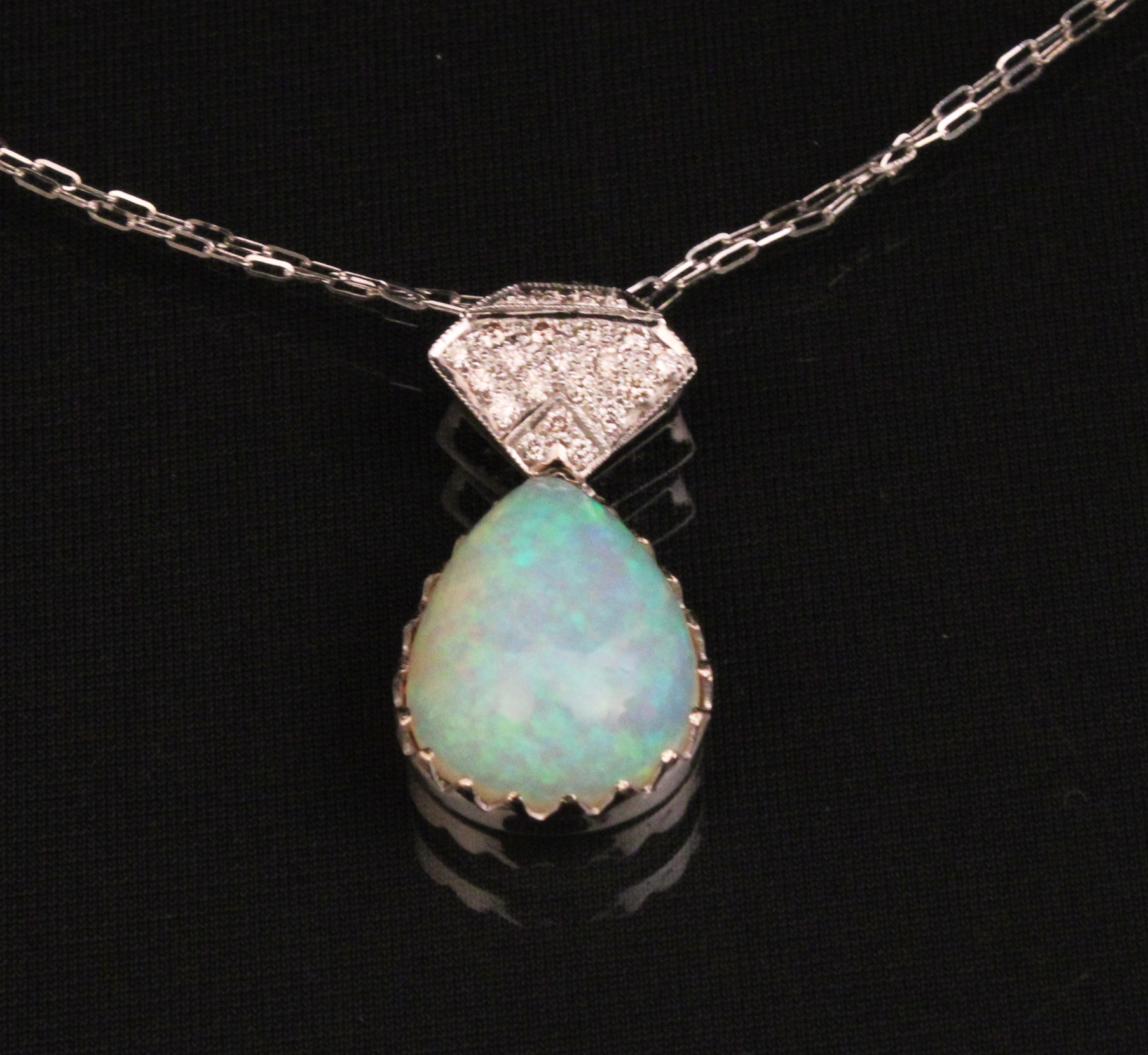 18K GOLD DIAMOND AND FIERY OPAL