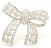 18K GOLD & DIAMOND RIBBON BROO