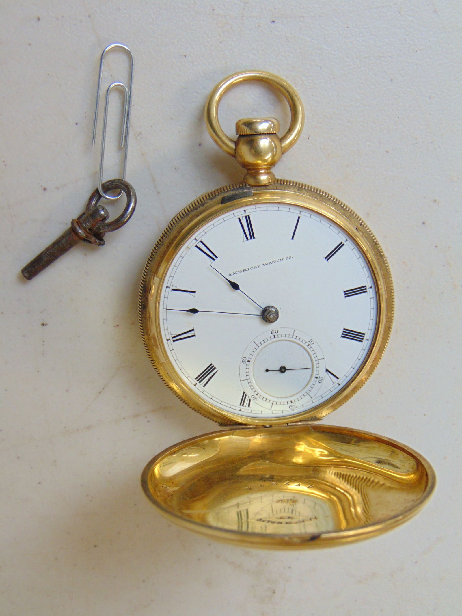 18K GOLD KEY WOUND WATCH BY