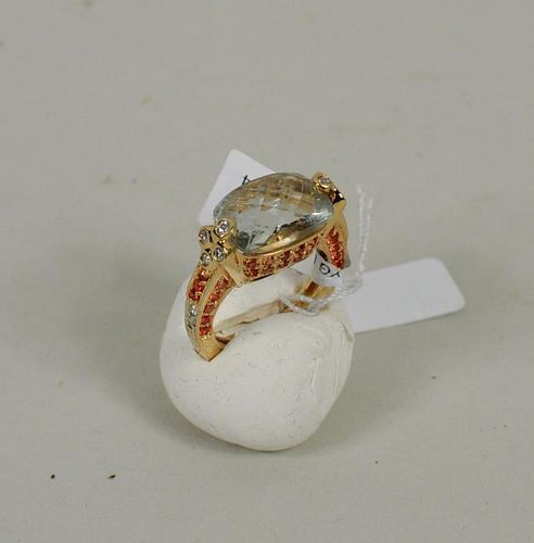 18K LADIES RING WITH LARGE GREEN