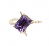18K TANZANITE & DIAMOND RING;