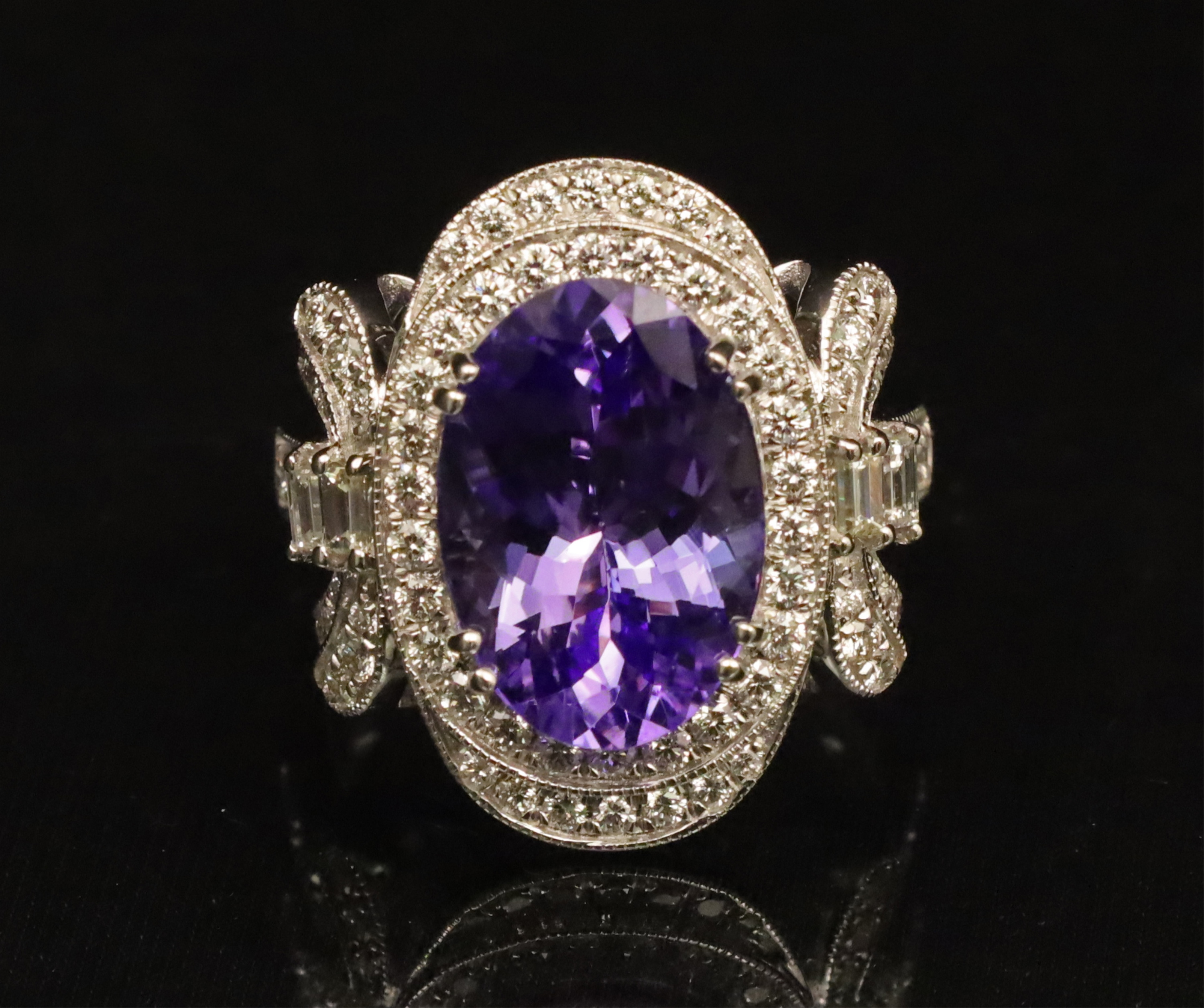 18K WG TANZANITE & DIAMOND RING,