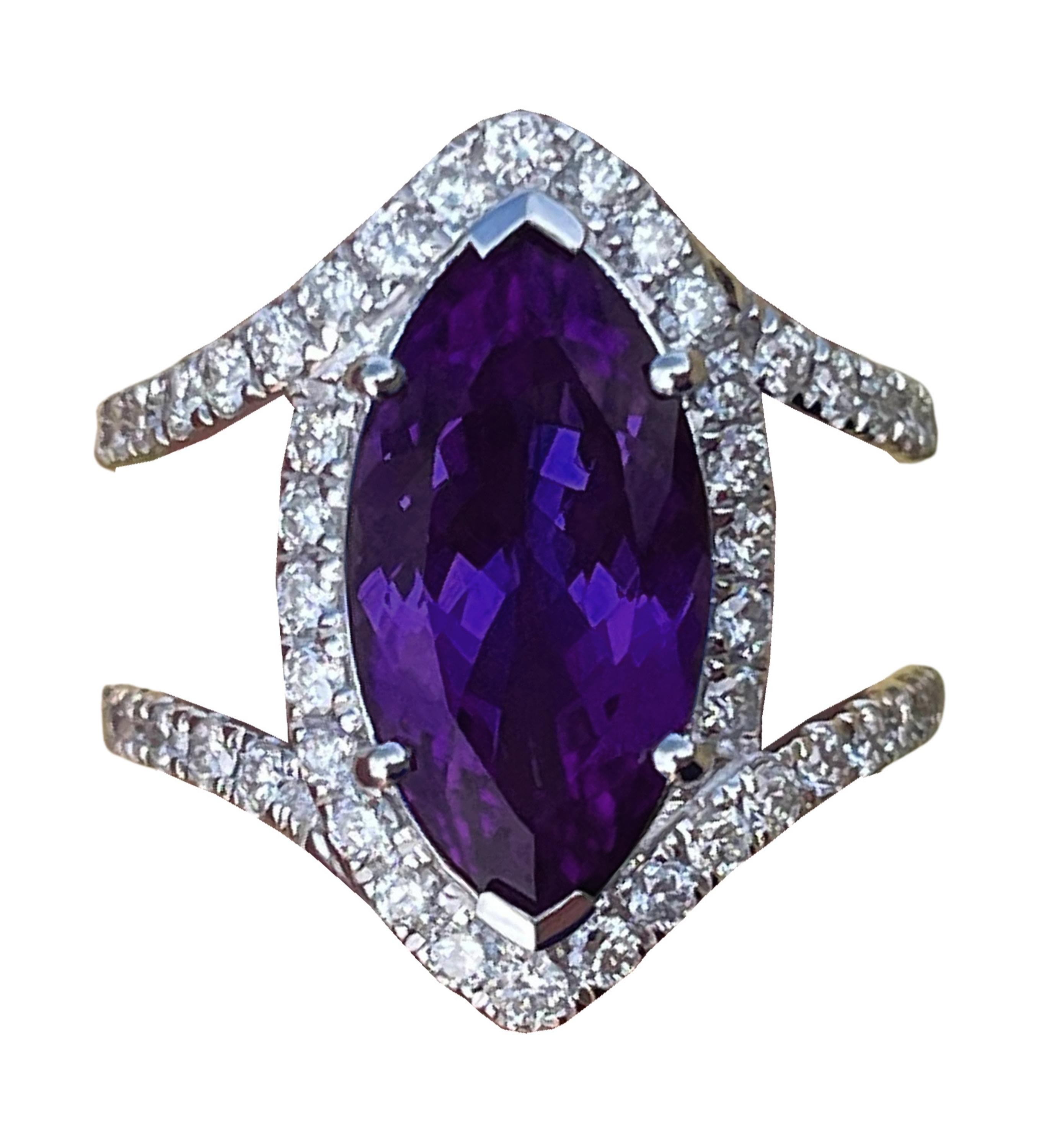 18K WG TANZANITE & DIAMOND RING 18K