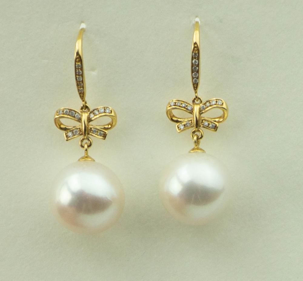 18K YELLOW GOLD AND DIAMOND SOUTH