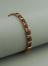 18K YELLOW GOLD AND RUBY BRACE