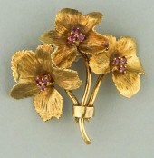 18K YELLOW GOLD AND RUBY FLOWE