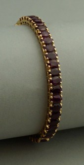 18K YELLOW GOLD AND RUBY BANGL