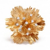 18KT GOLD AND DIAMOND BROOCH,