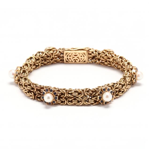 18KT GOLD AND GEM-SET BRACELET