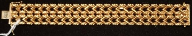 18KT GOLD DESIGNER BRACELET, 7 1/4"
