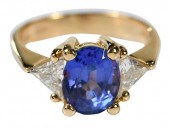 18KT. TANZANITE & DIAMOND RING