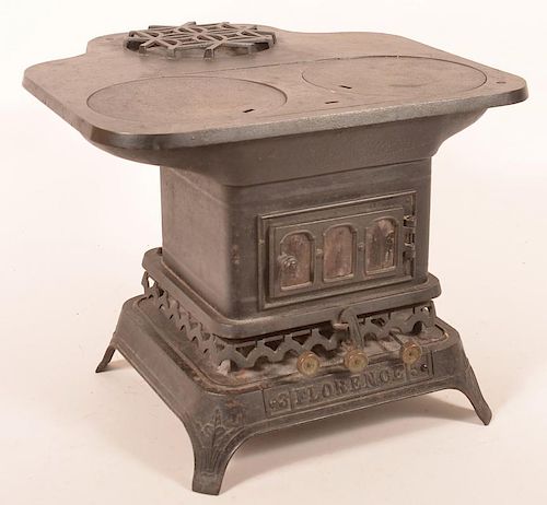 19 CENTURY CAST IRON MINIATURE COOK