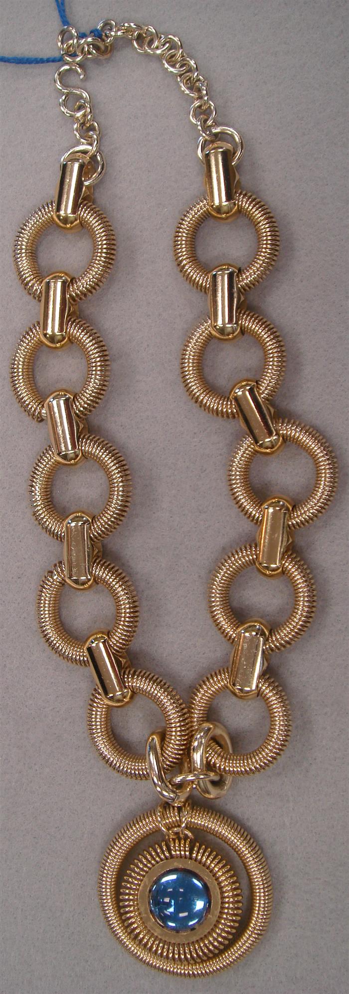 1970's gold metal necklace styled