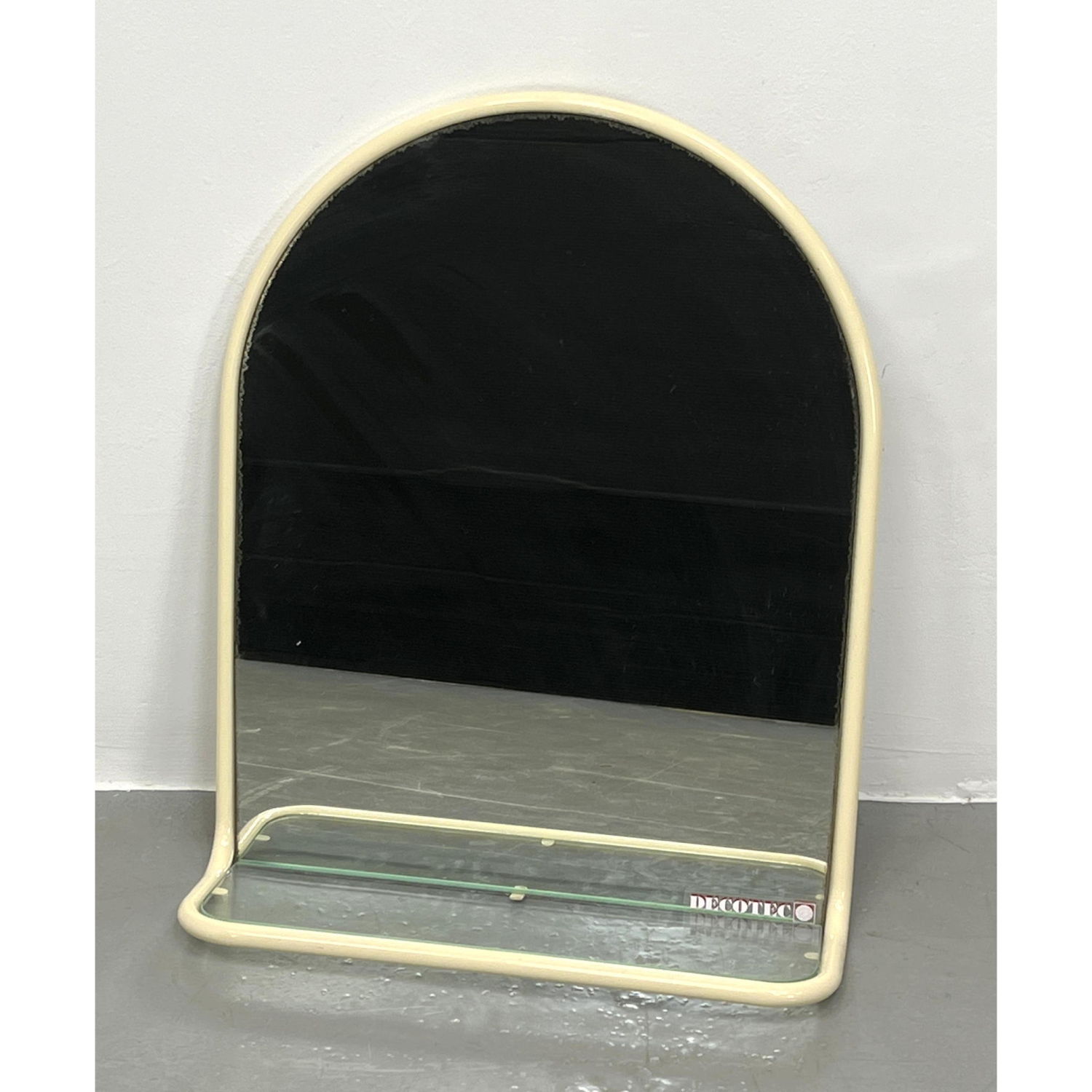 1980s Wall mirror with shelf.