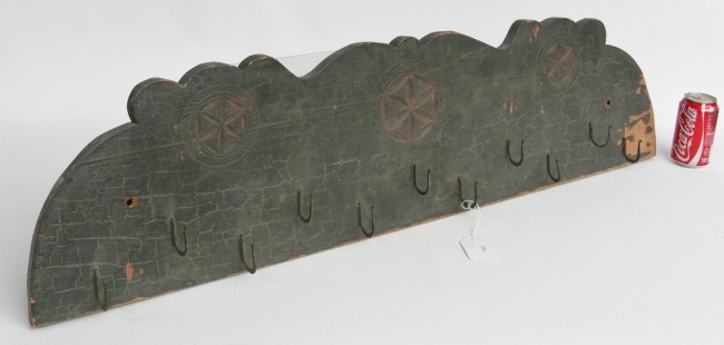 19th c. carved wooden hook rack.