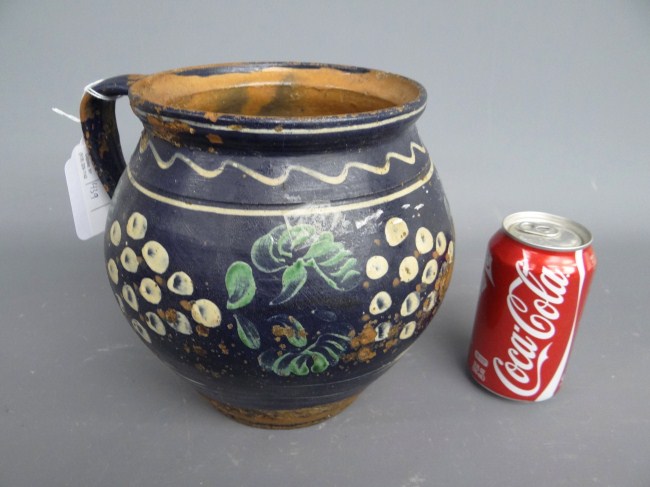 19th c. French redware jug. 8 1/2''