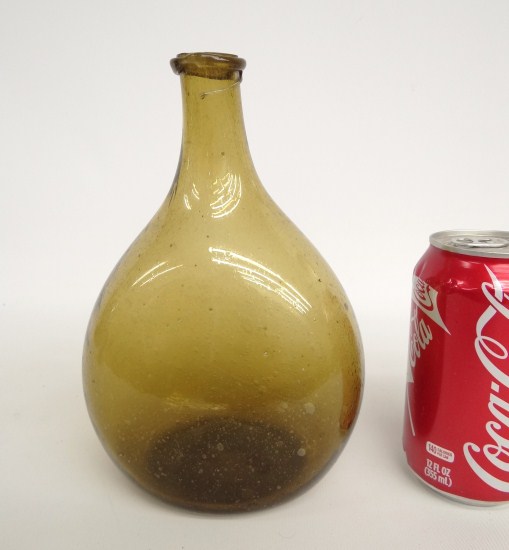 19th c. glass bottle. 8 1/2'' Ht.