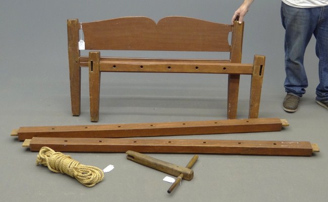 19th c. hired man's rope bed in red