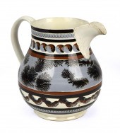 19TH C. MOCHA CREAMWARE POURIN