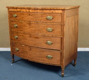 19th C. pale mahogany bow front