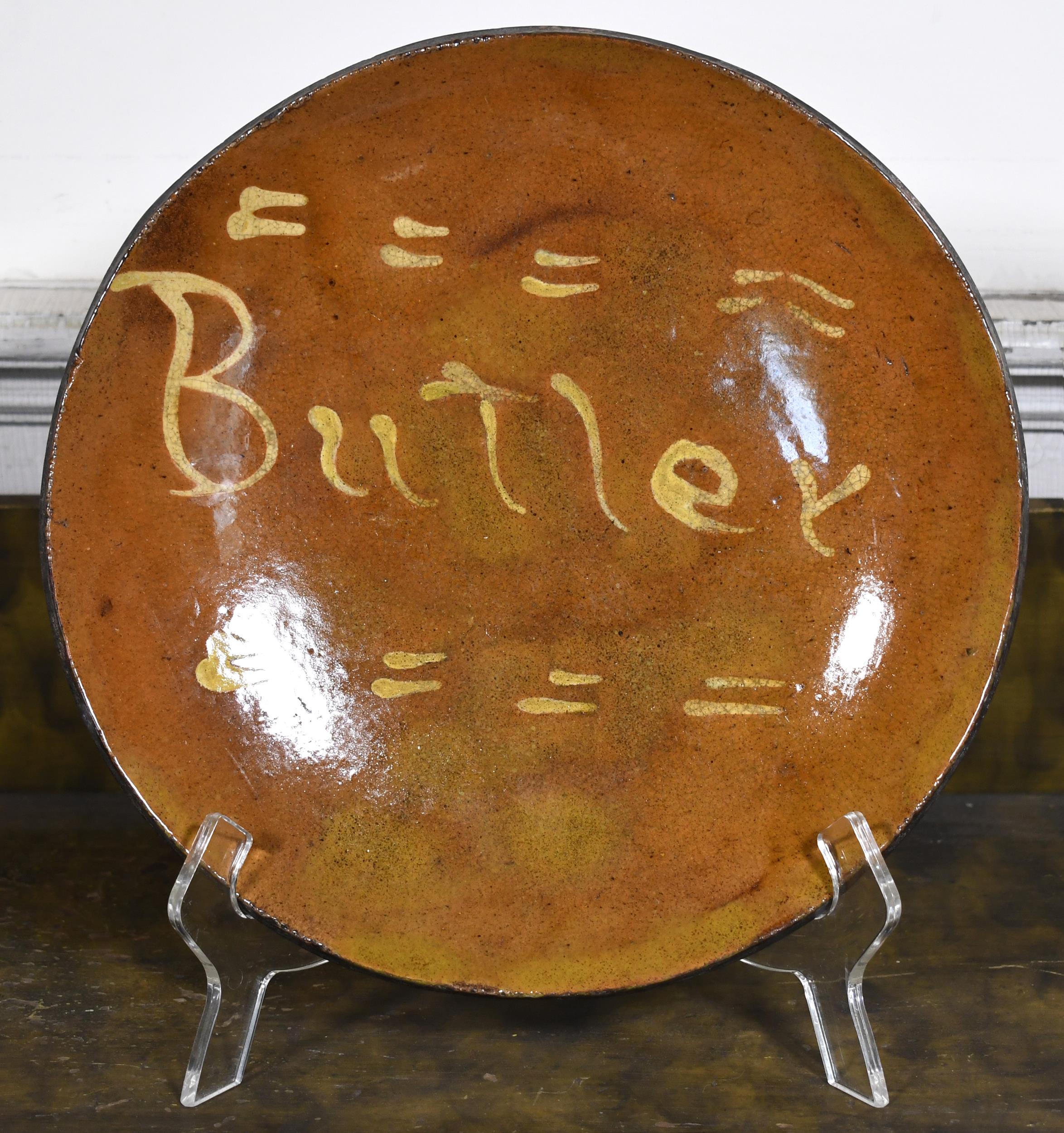 19TH C. REDWARE PLATE, BUTLER.
