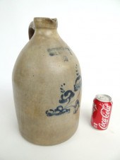 19th c. stoneware jug with flo