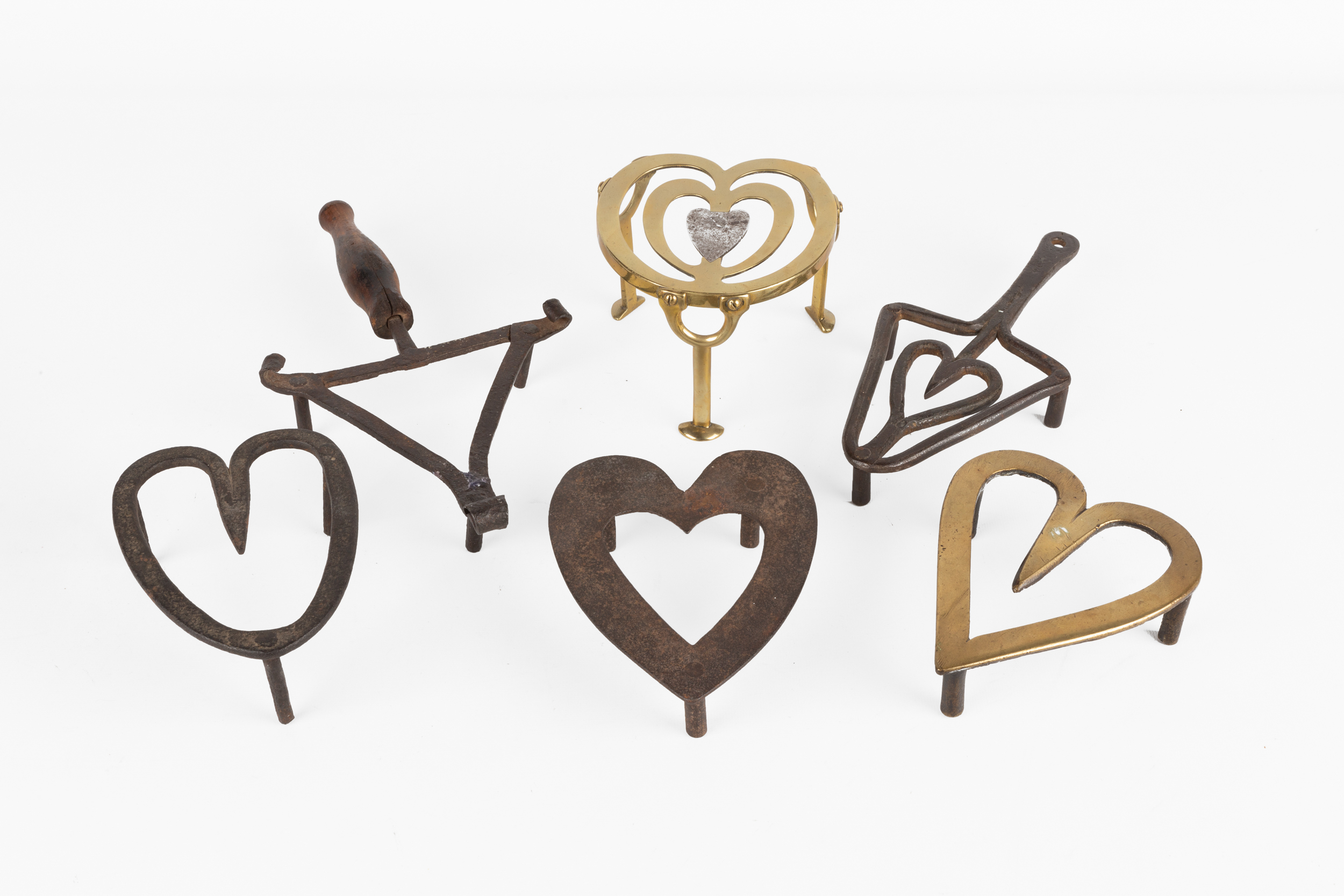 19TH CENTURY IRON AND BRASS HEART