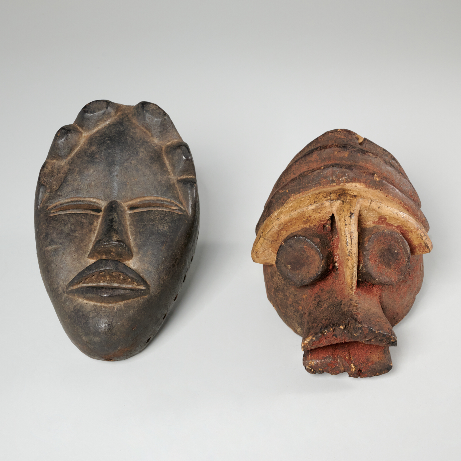 (2) AFRICAN CARVED WOOD MASKETTES