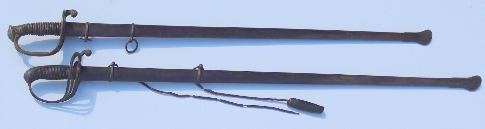 2 ANTIQUE SWORDS AND SCABBARDS From