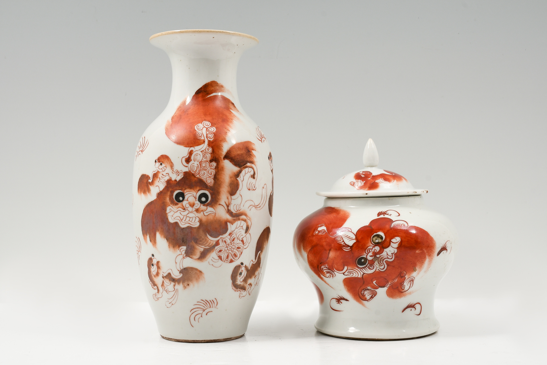 2 BALUSTER FORM CHINESE FOO DOG