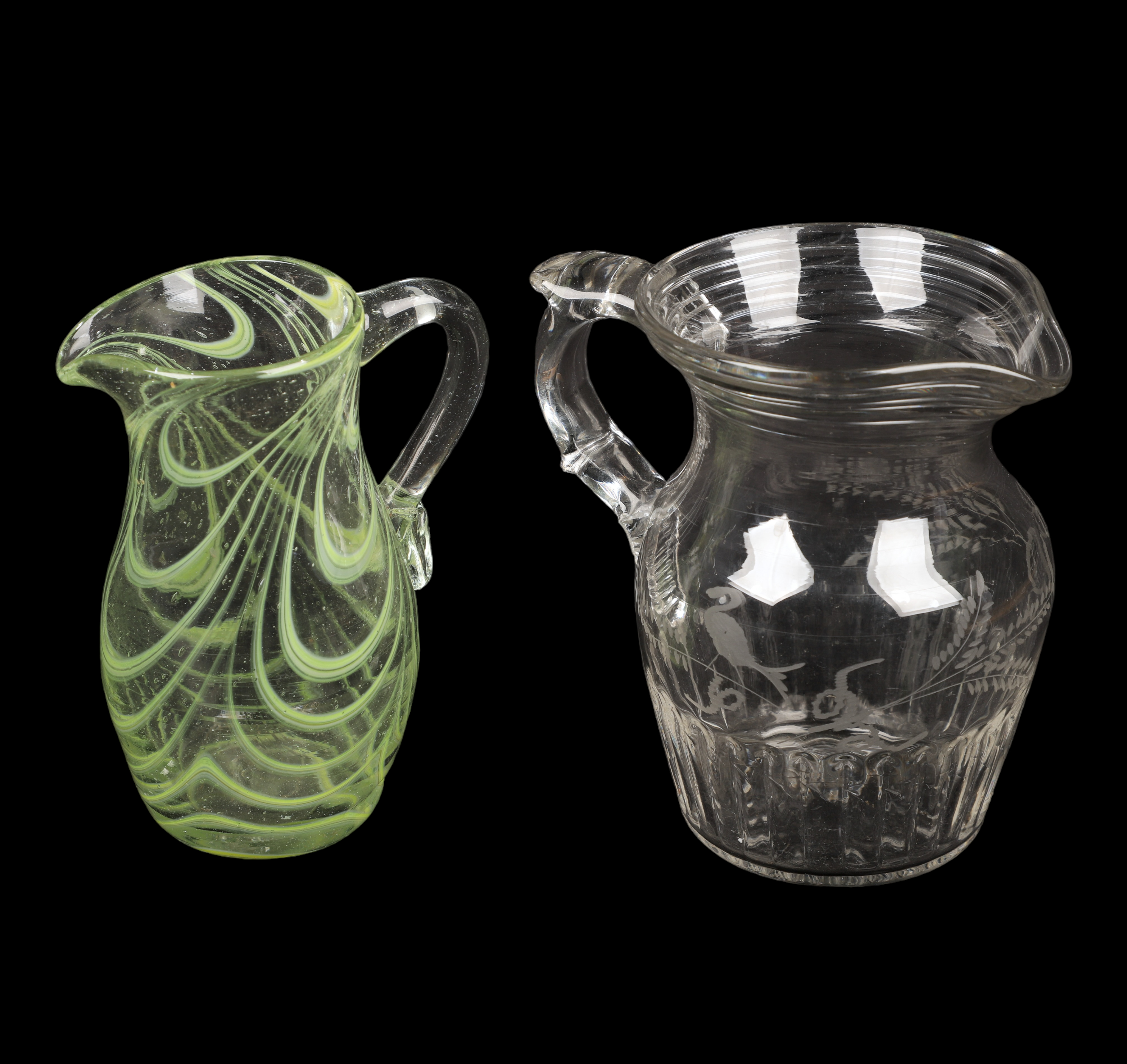 (2) Blown glass pitchers, c/o clear