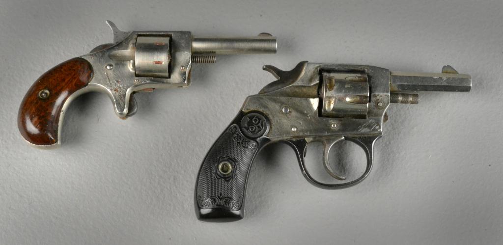 (2) Book with Antique Hand GunsTo
