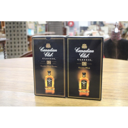2 bottles of Canadian Club