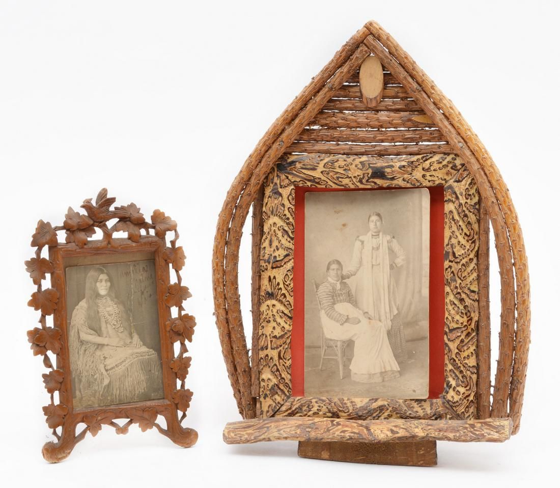 2 CARVED PICTURE FRAMES WITH NATIVE