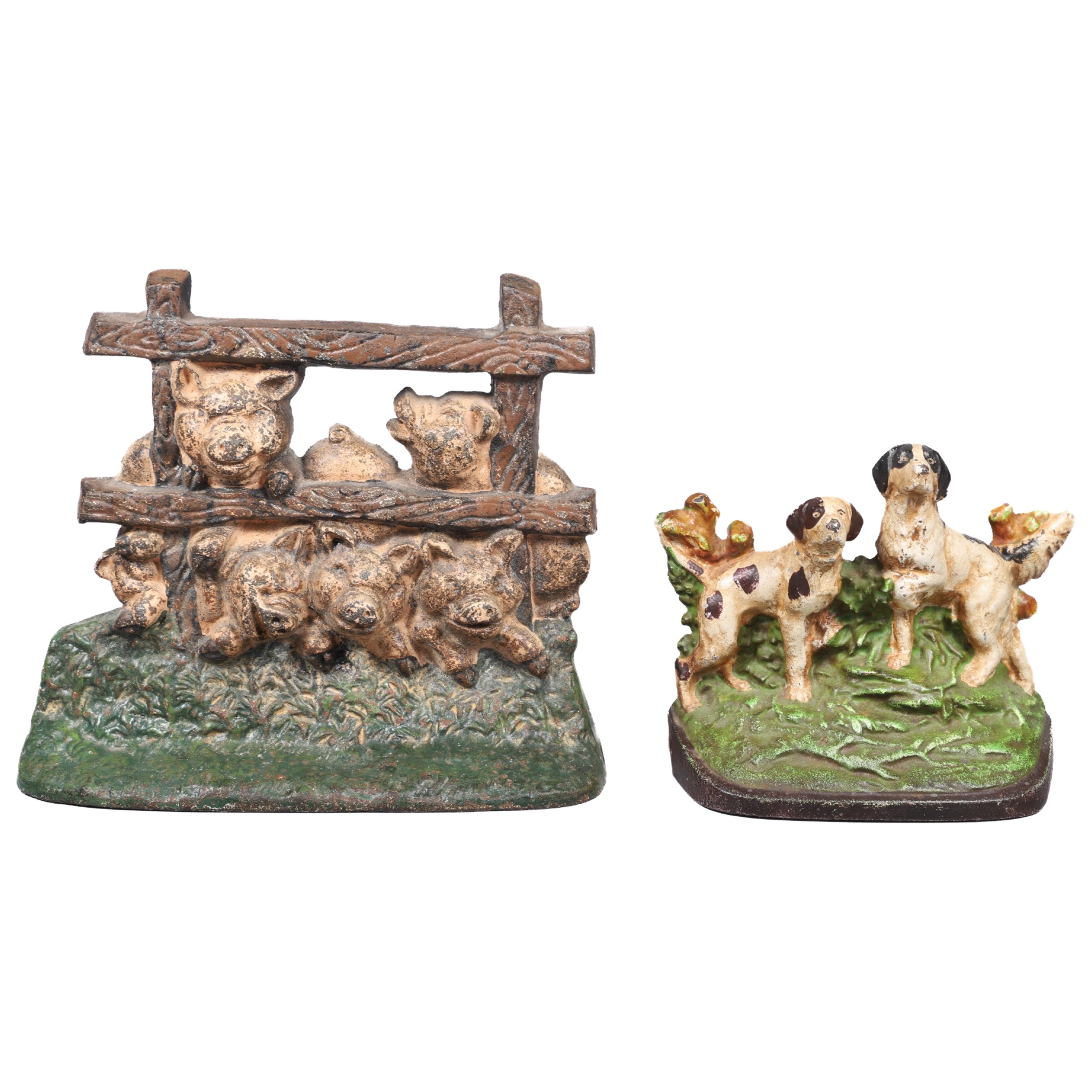 (2) Cast iron doorstops, c/o