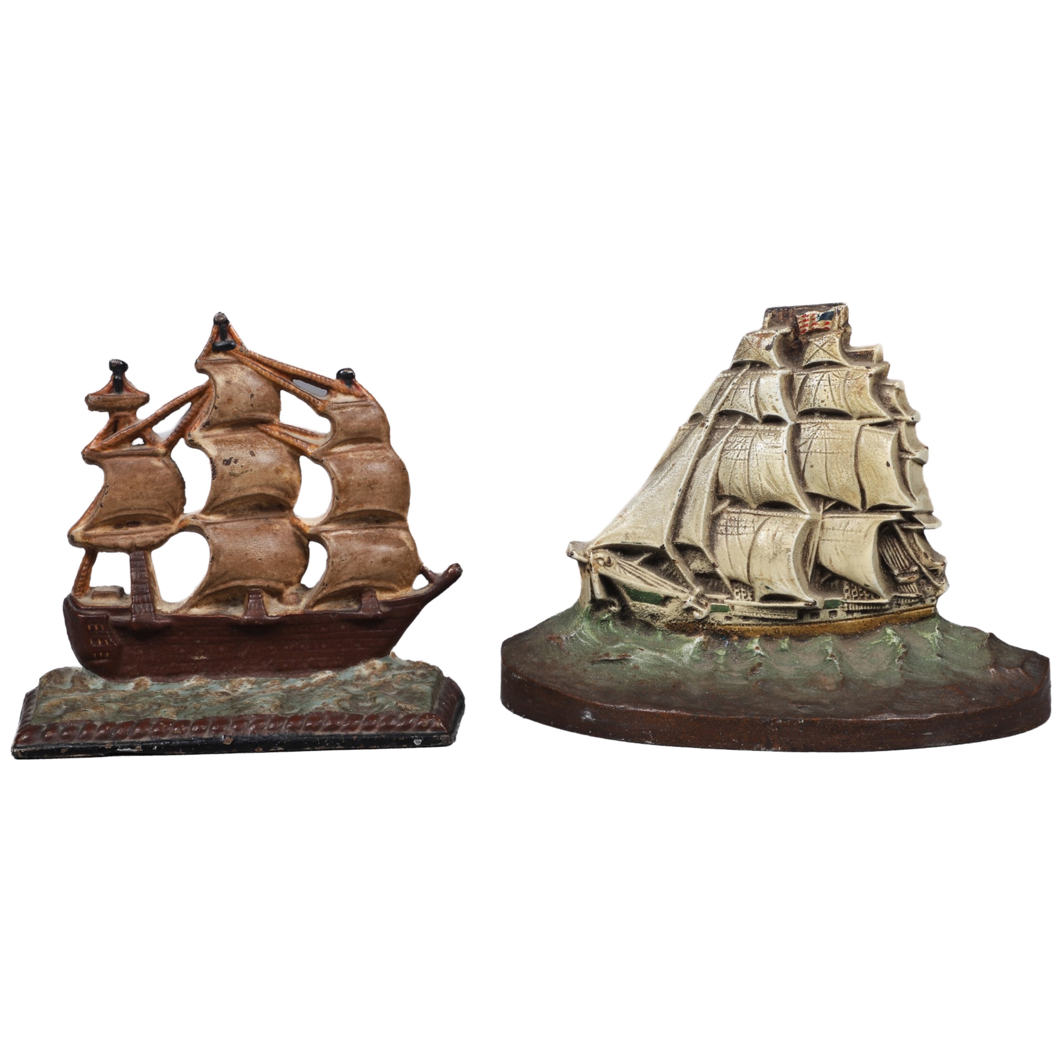 (2) Cast iron doorstops, sailing