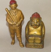 2 CAST IRON FIGURAL PENNY BANK