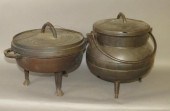 2 CAST IRON FOOTED KETTLES WIT