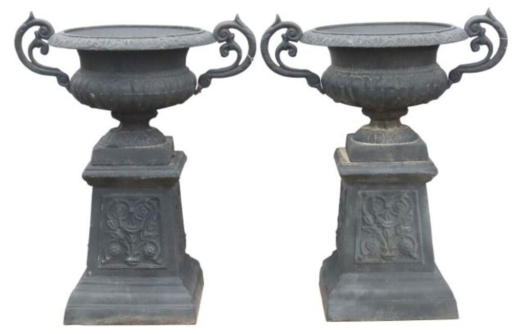 (2) CAST IRON GARDEN URN PLANTERS